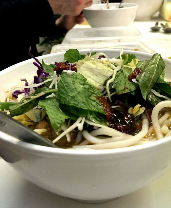 Eating beef pho from Super Bowl, Richmond, Melbourne